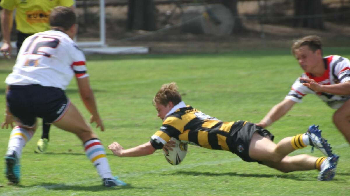 TWO-TRY HERO: Scone’s Alex Dahmes grabbed a double in the Greater Northern Tigers’ 40-4 victory over the Central Coast Roosters in the Andrew Johns Cup at Olympic Park, Muswellbrook. 