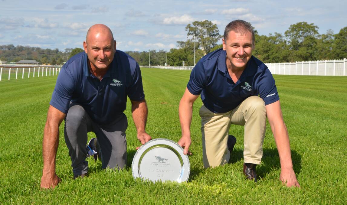 BRAGGING RIGHTS: Muswellbrook Race Club track manager Steve Bottomley and general manager Duane Dowell with the Footy Codes Sprint plate.