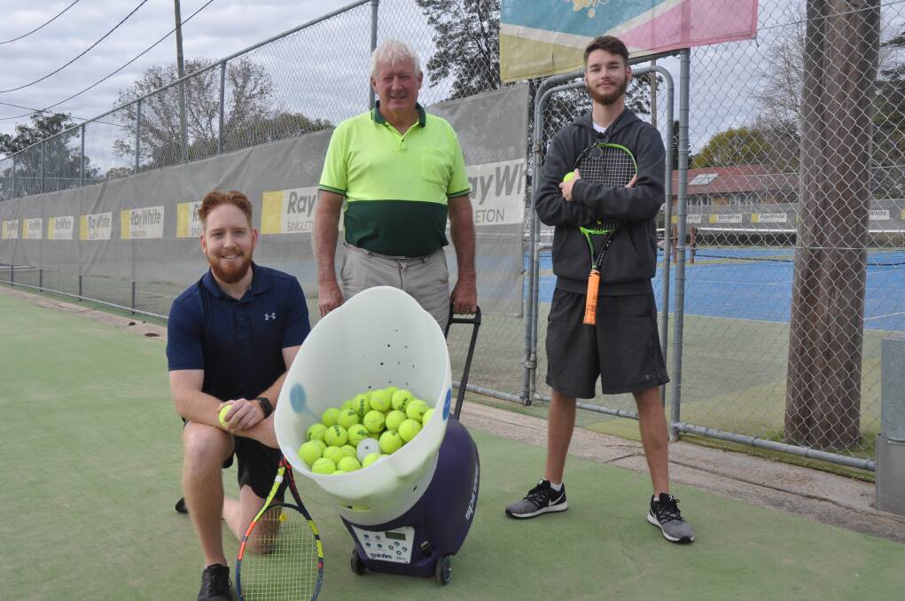 Howe Park Tennis Club Inc president Craig Miles (centre) with young coaches Cameron Phillips and Mitchell Ryan