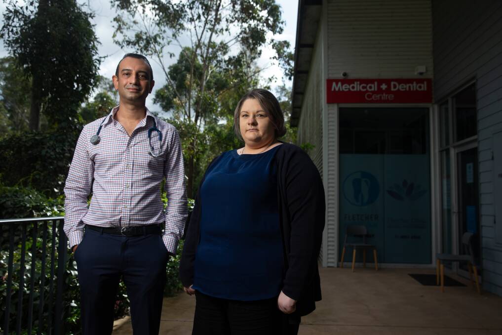 Doctors wanted: Fletcher Clinic's Dr Poonacha Kanjithanda and practice manager, Maddie Ingall have two empty rooms despite growing demand for medical services. Picture: MARINA NEIL