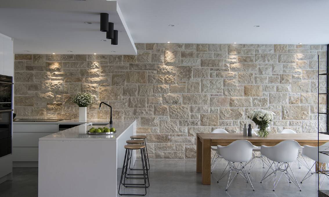 HISTORY: The foundation's sandstone blocks are a feature wall in the modern addition, and likely sourced from Sydney's Centennial Park in the late 1800s. 