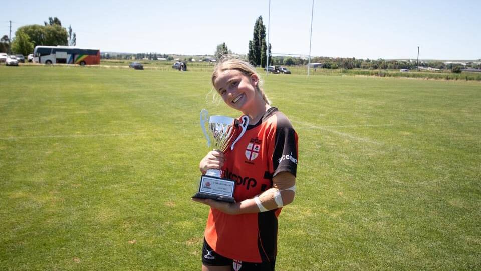 HUGE WIN: Sophie Clancy posing with the Chikarovski Cup, which she helped NSW Country win last weekend.