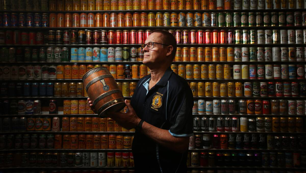Australian Beer Can Collectors Association NSW division committee member Dave Hugo with his collection. Picture by Simone De Peak 