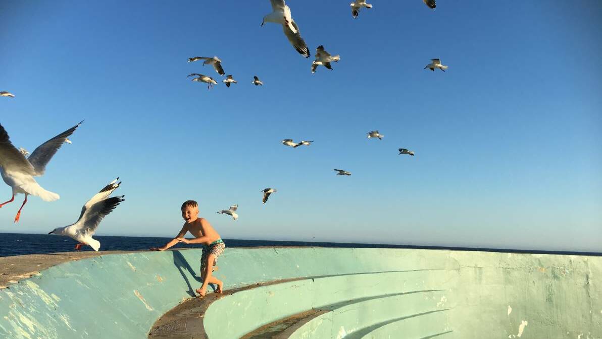 FLOCK TOGETHER: Jo Davis' shot at Newcastle Ocean Baths was the winner of the 2017 Hunter Photography Prize.