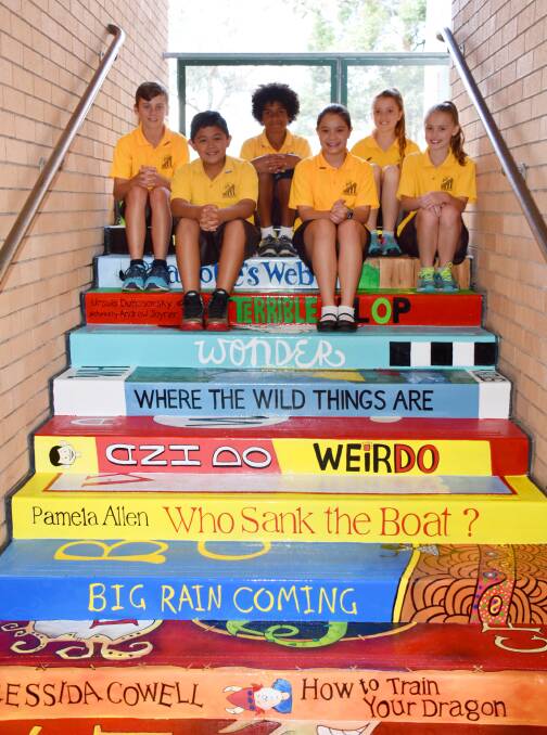 OPEN: Celebrating the new stairs was the newly elected students first job as school leaders.