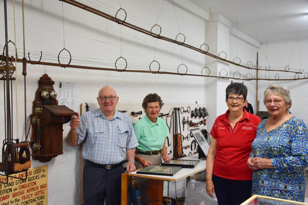 The Singleton Historical Society with the newly added Ericsson Wall phone.