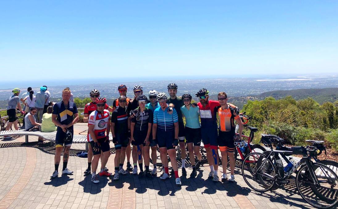 The enthusiastic group of riders cycled 800.3km for undiagnosed diseases. The group is pictured at Mount Lofty overlooking Adelaide city. 