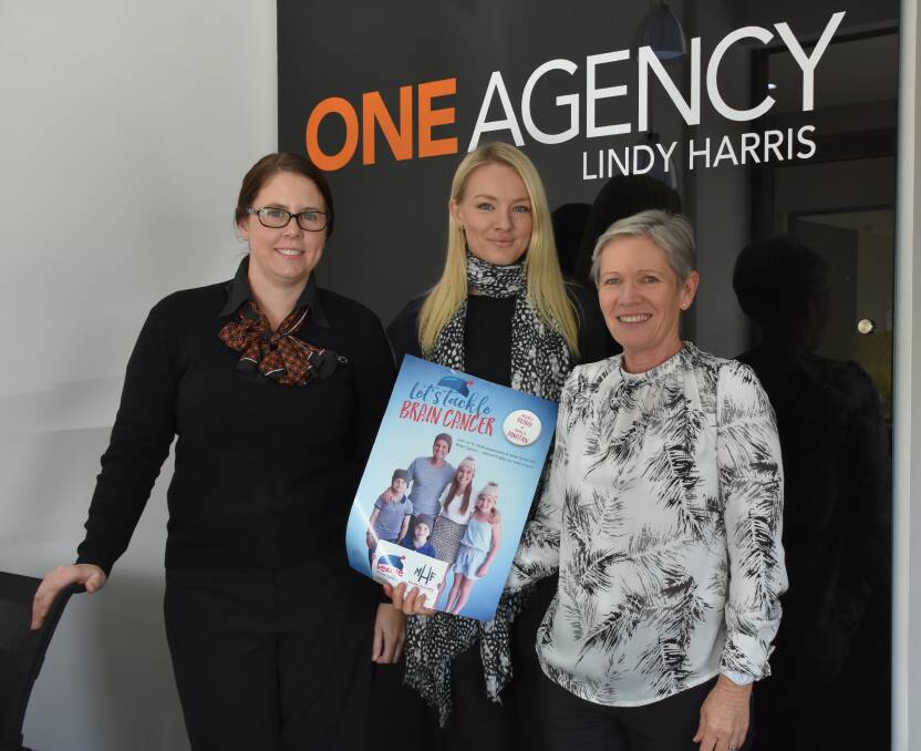 FUNDRAISER: One Agency employees Rochelle Parsons, Olivia Pfeiffer and Jo Tull have sold over 500 beanies this year for the Mark Hughes foundation. 