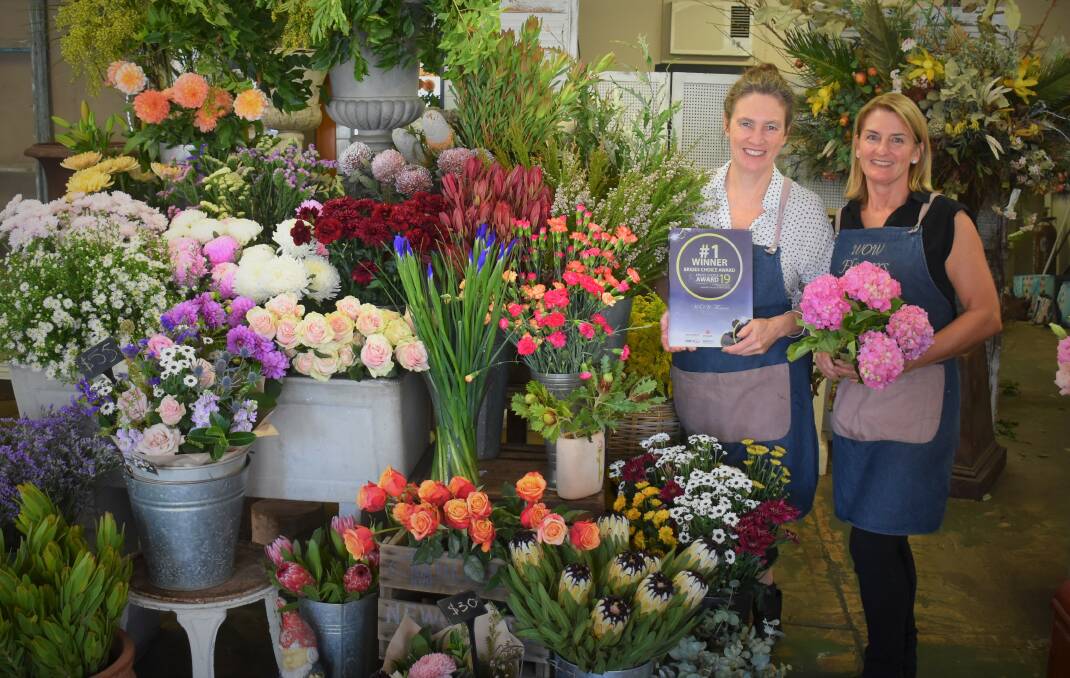 BRIDES FAVOURITE: WOW Flowers owner Louise Christensen and florist Gayle Lewis ecstatic with their win at the regional Bridal Choice Awards. 