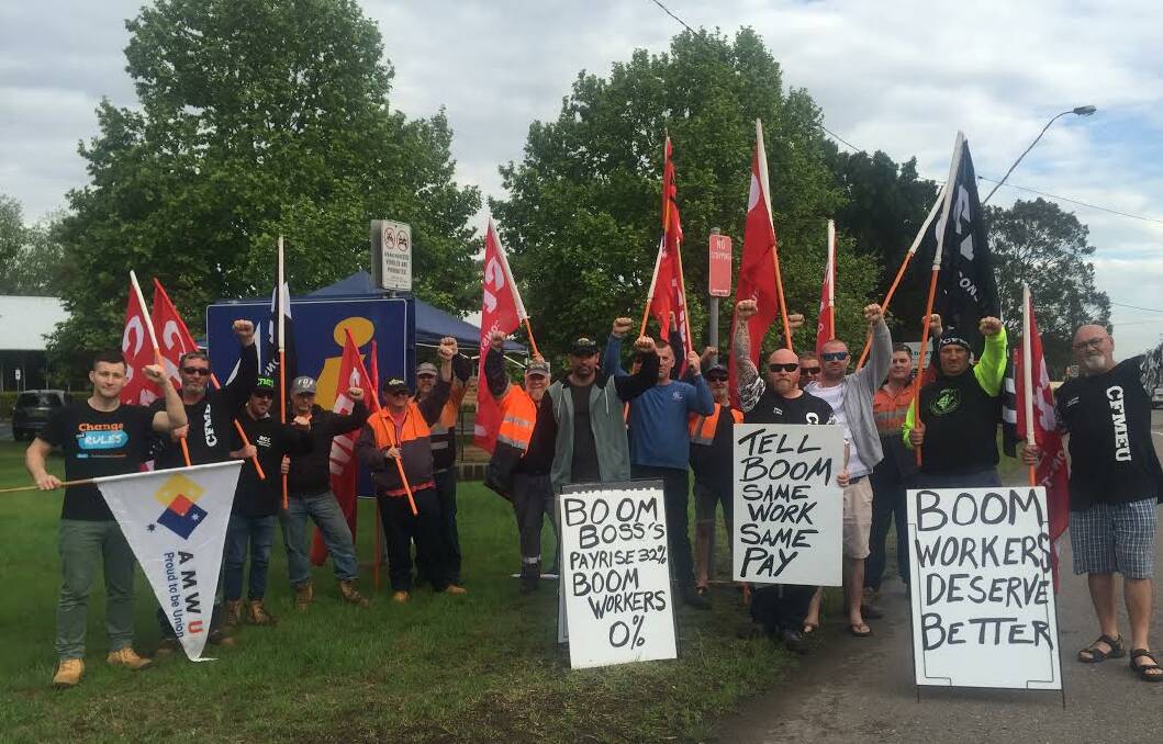 Boom Logistic workers and their supporters protest in Townhead Park at the company's failure to negotiation on wages. 