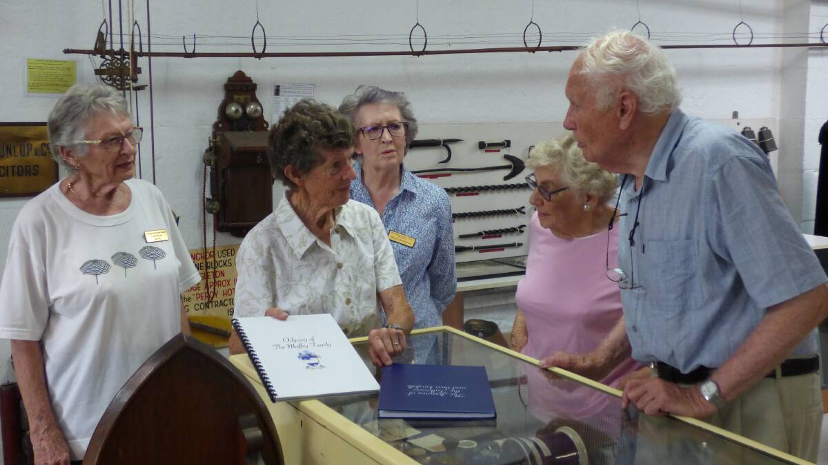 LOCAL MEDICAL HISTORY: Museum members talking to Jenny and John Maffey at the Museums Maffey display
