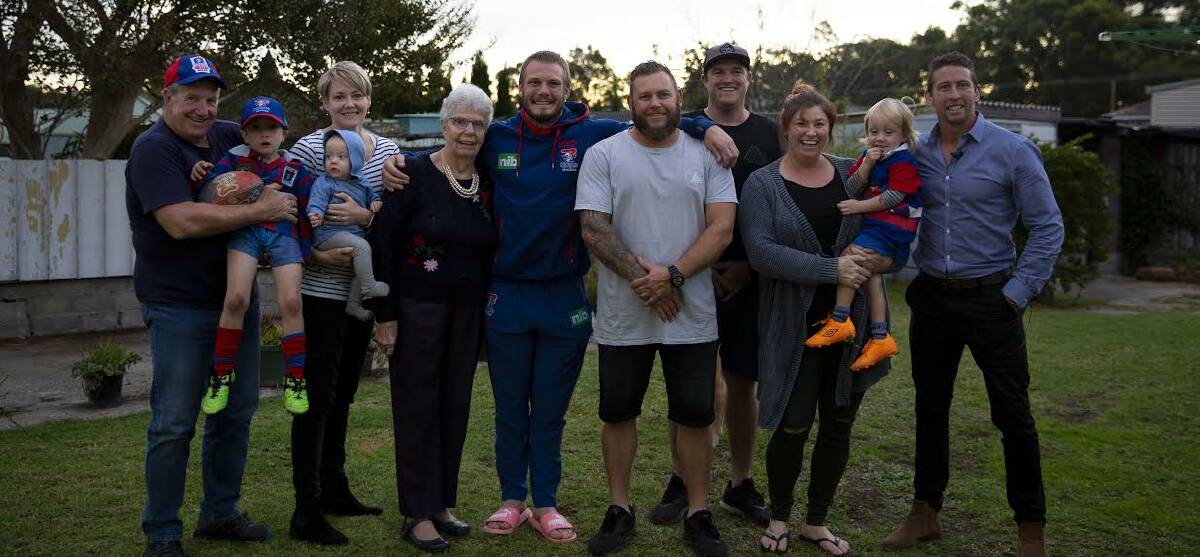 Lace Matthias (second from right) and family with Nathan Ross (middle) and Kurt Gidley (far right).