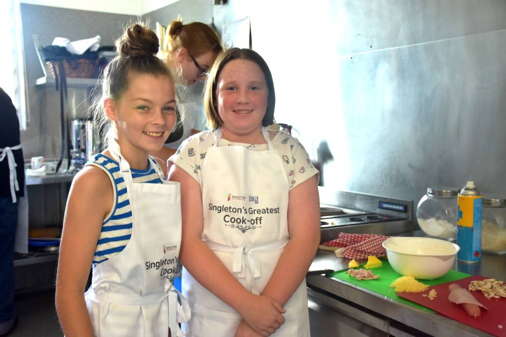 YOUNG CHEFS: Megan Tanner and Grace Russel prepping their big breakfast at Singleton Youth Centre.