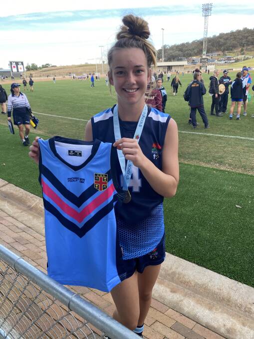 AFL STAR: Fourteen year old Molly Thomas was selected to play for the Combined High Schools U15's State team this year after remaining undefeated with the CCC U15's team. 