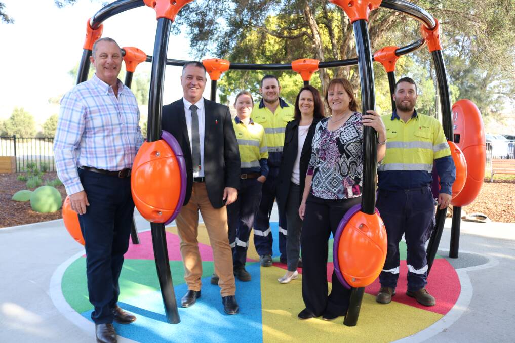 PLAY: Member for Upper Hunter Michael Johnsen MP, General Manager Jason Linnane and Mayor of Singleton, Cr Sue Moore with Council staff at the new all abilities playground at Rose Point Park. 
