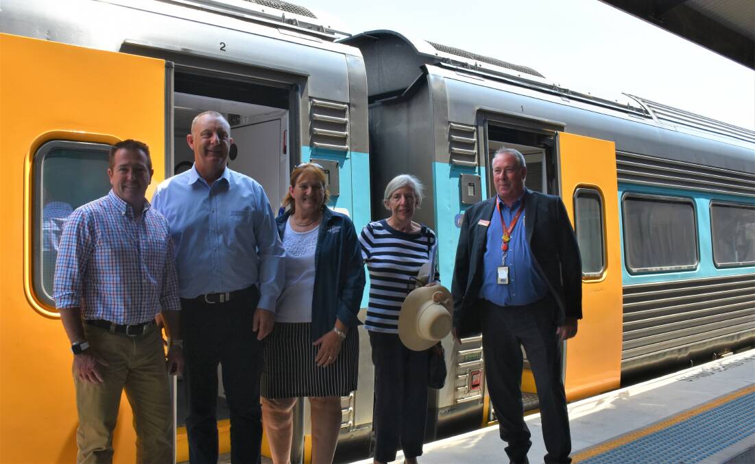 ON THEN PLATFORM: Paul Toole (Minister for Regional Transport and Roads), Michael Johnsen (Member for the Upper Hunter), Cr Sue Moore (Singleton mayor), Anne Boyd (Advocate for Two More Trains for Singleton) and Robert Blanch (NSW Trainlink).