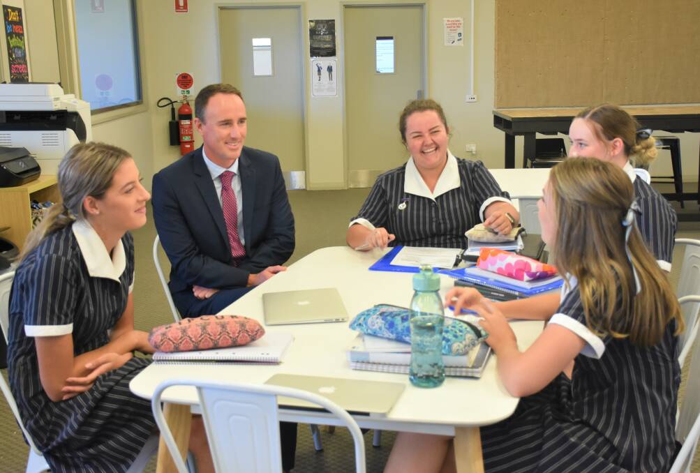 SENIOR STUDIES: Australian Christian College principal Tim Shields pictured with his Year 12 students following three years of hard work.