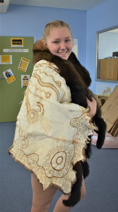 TRADITION: Year nine student Ainsley wears the cloak with pride. 