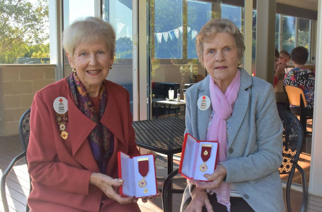 Susan Ginns and Betty Knight have received Outstanding Service Awards for their contributions to the Red Cross Singleton Branch. 