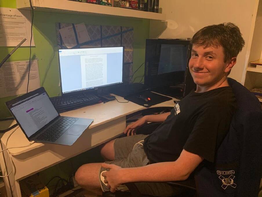 ONLINE LEARNING: Year 11 student Louis Moore has already been late to 'school' twice since he transitioned to online learning despite the lessons taking place less than two metres from his bed. 