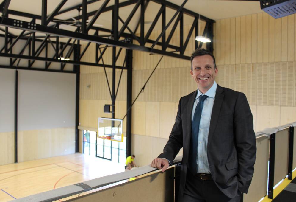 PRIDE: Principal of St Philip's Christian College in Cessnock, Darren Cox, in the newly completed sports centre at the school.