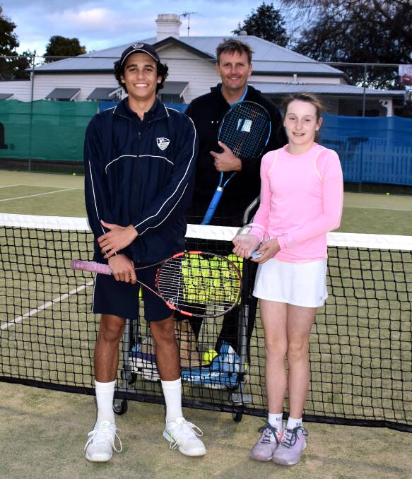 Singleton's rising tennis stars Adam Walters and Ella McLeod with coach Gary Brenton. 