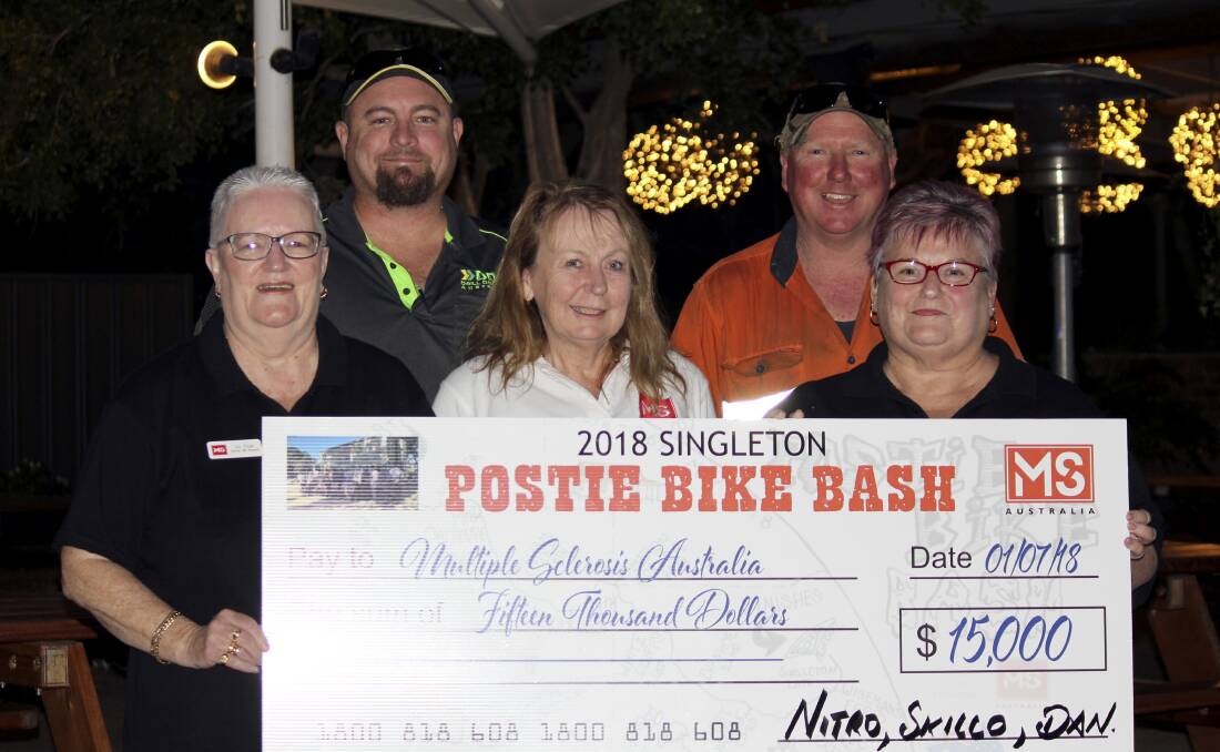 WORTH CAUSE: Representatives from the Hunter Multiple Sclerosis fundraising branch with the Dan and Nitro.