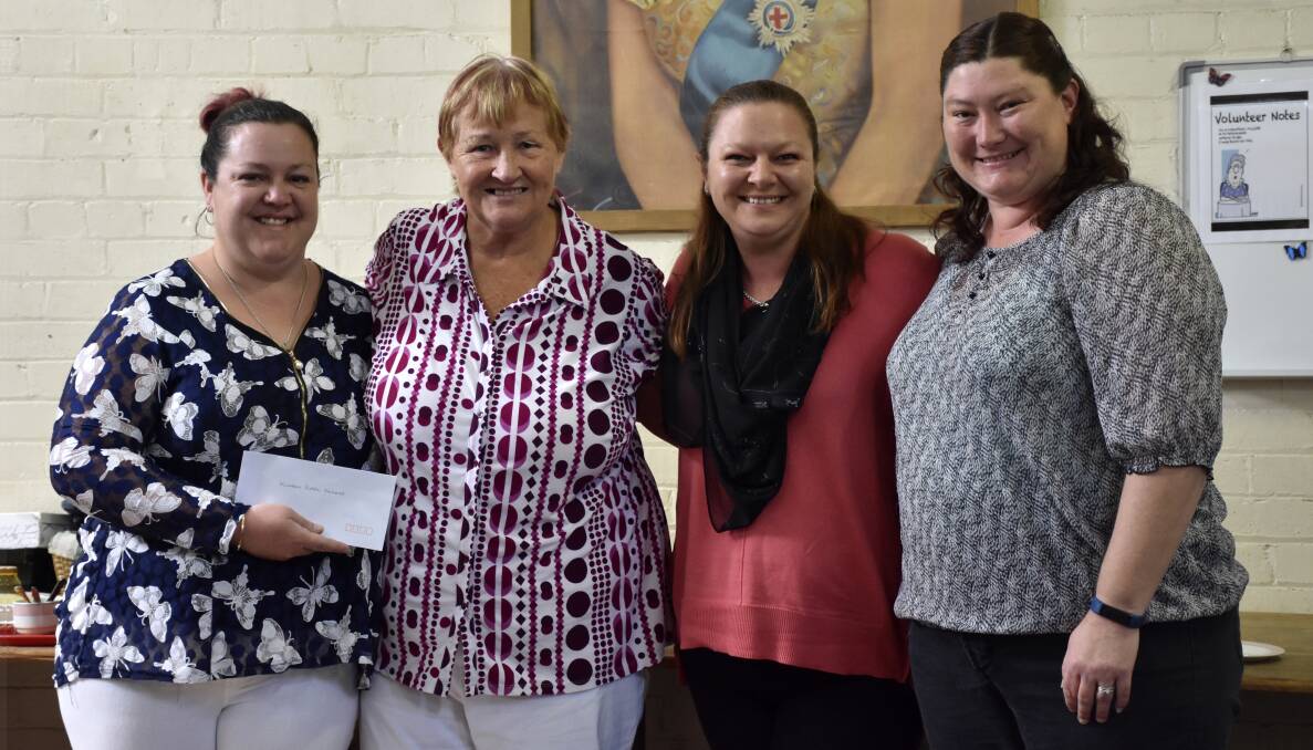MUCH NEEDED: Kirkton P&C reps with volunteer Lynne-Maree Tassew. They will use the money to get their closed canteen up to code.