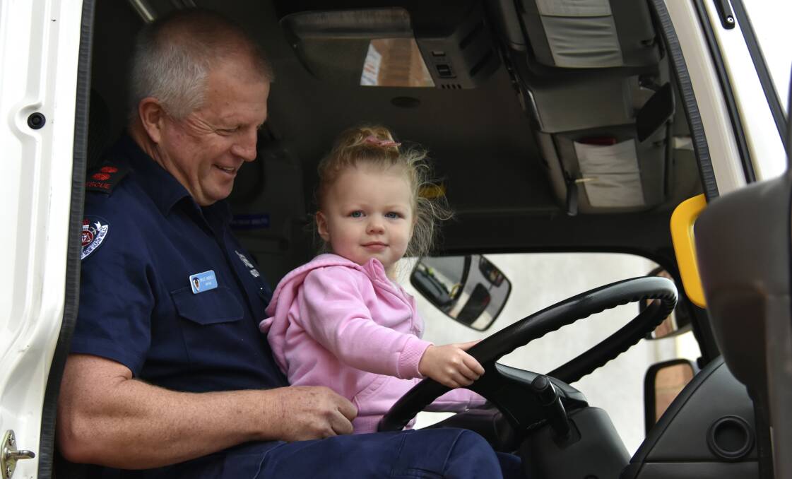 Captain Bruce Ambrose with his granddaughter.