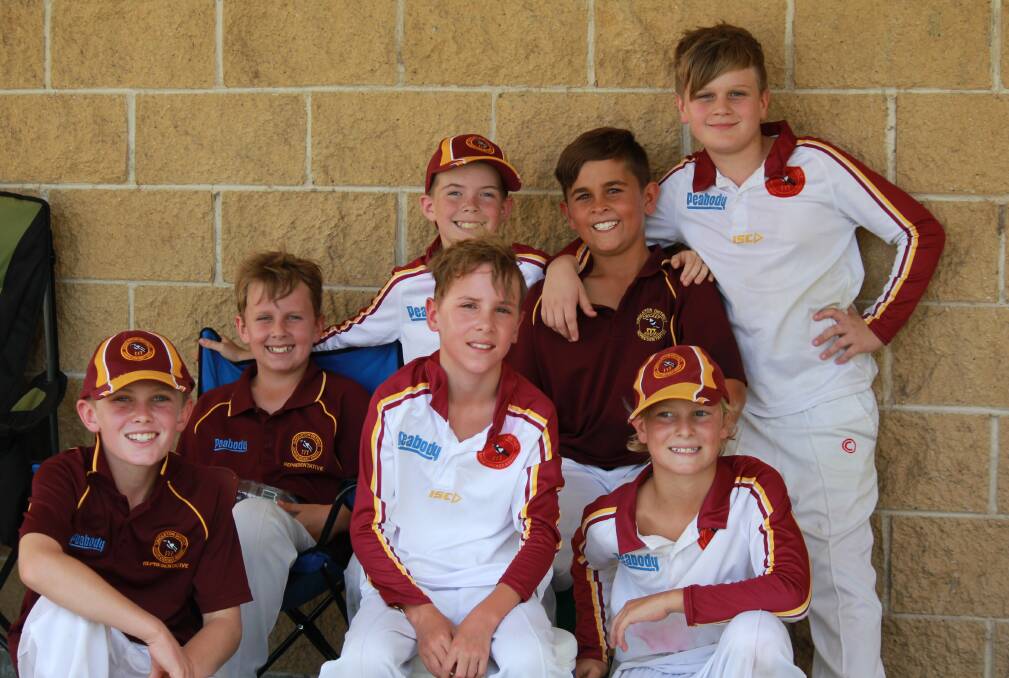 Some of the U12's finding some shade on Sunday.