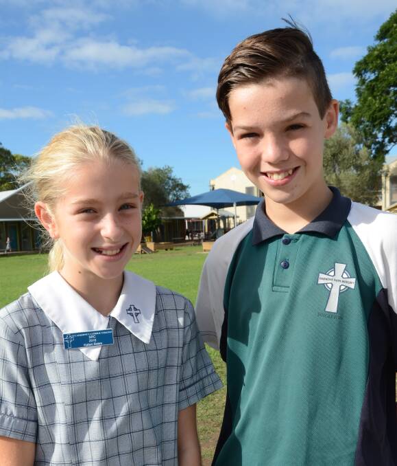 EXCITED: Kalani Bates (Year 6) and Dominic O’Brien (Year 7) will collect $100 prize money at an official reception during Catholic Schools Week.