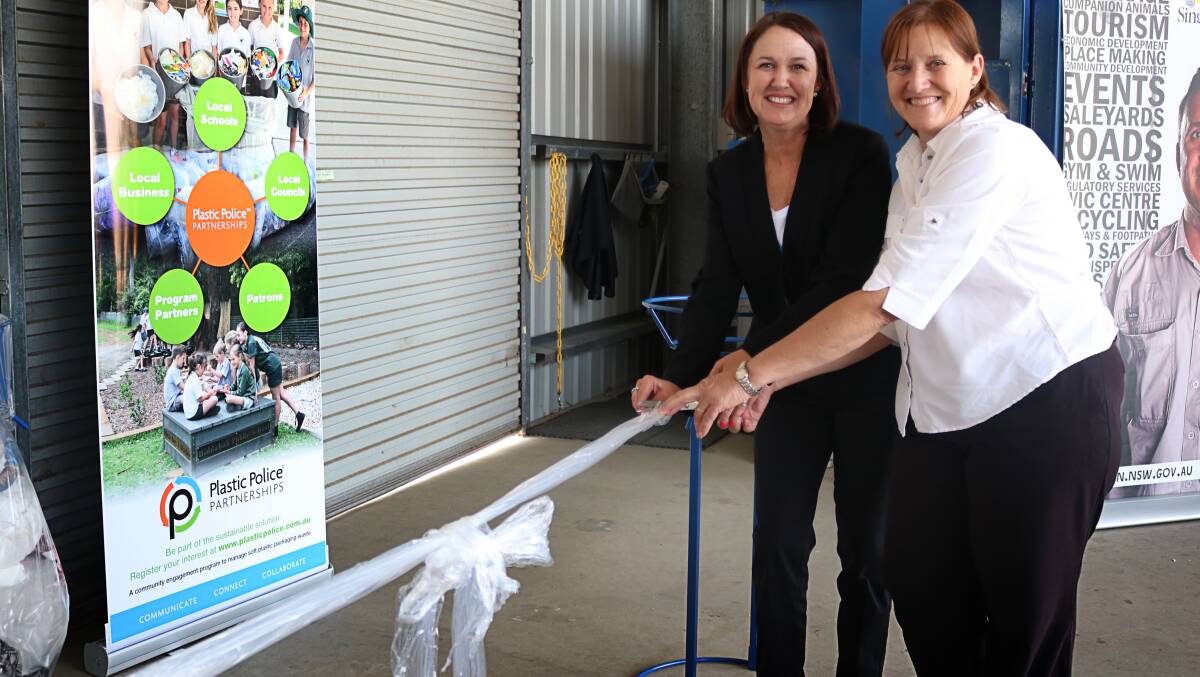 NEW INITIATIVE: Samantha Cross from Plastic Police Partnerships and Mayor of Singleton, Cr Sue Moore, officially cut the plastic ribbon at this morning’s launch. (The plastic ribbon will be recycled.)