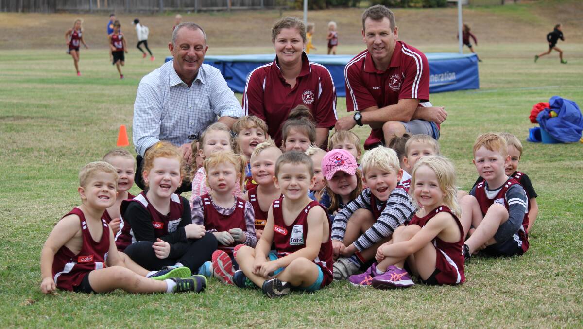 GRANT: Mr Johnsen and president, Scott O'Bryan, with some of the Tiny Tots on Tuesday afternon.