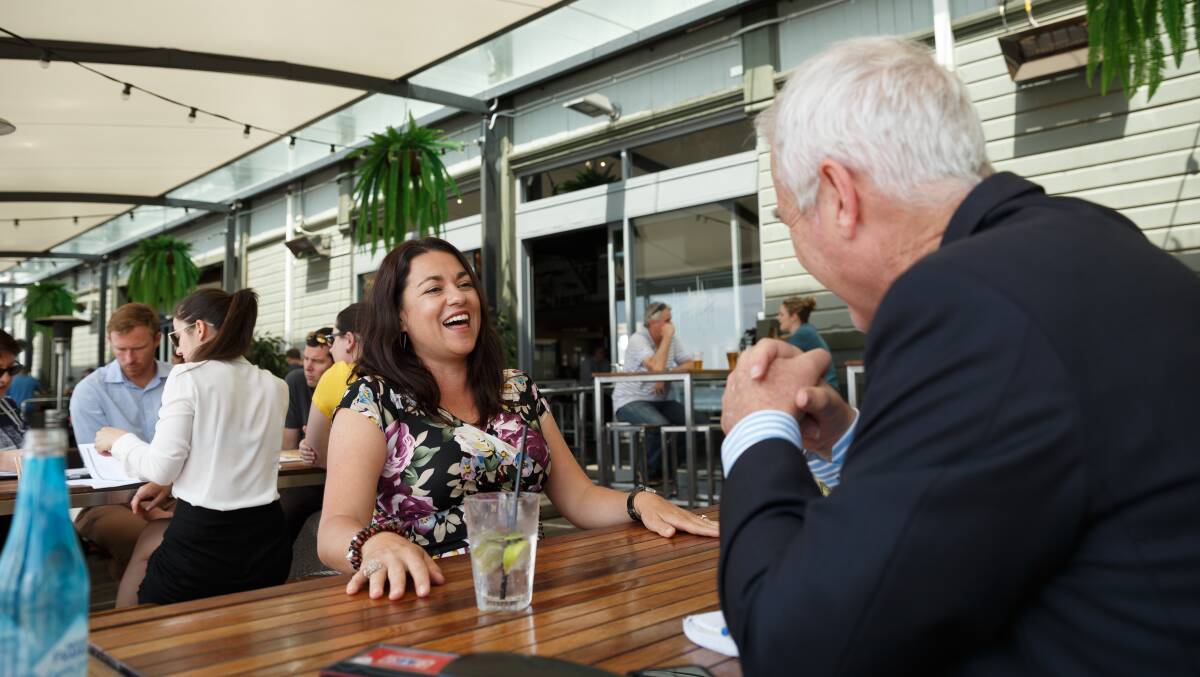 Cherie Johnson shares a laugh with Scott Bevan over lunch. Picture: Max Mason-Hubers