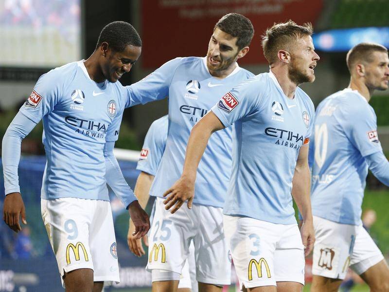Shayon Harrison (L) has scored a double in Melbourne City's 5-0 thrashing of lowly Central Coast.