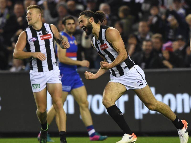 Collingwood's Brodie Grundy comes up against fellow champion ruckmen Nic Naitanui and Tom Hickey