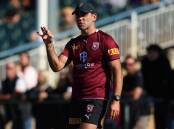 Queensland's State of Origin team have been soaking up tips and advice from Cameron Smith (pic).