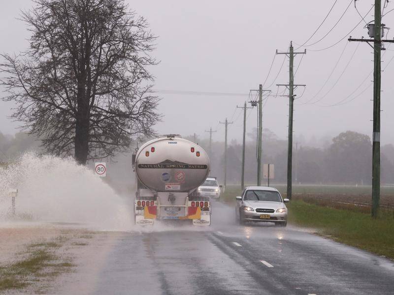 NSW is on watch for further flooding amid more heavy rainfalls and forecasts for severe storms. (JASON O'BRIEN/AAP PHOTOS)