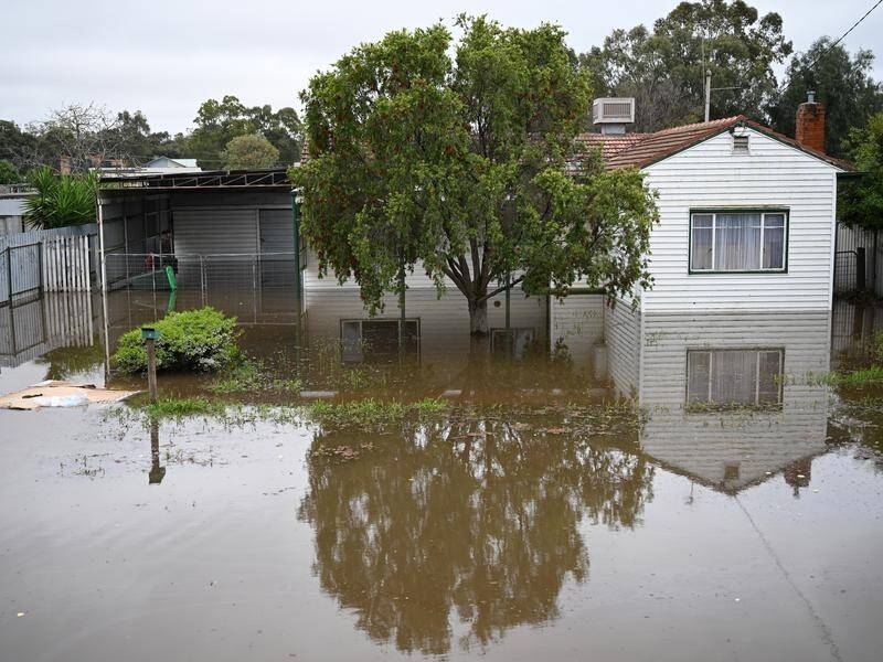 Residents in Tasmania, Victoria, SA and NSW have been warned more severe weather is expected. (James Ross/AAP PHOTOS)