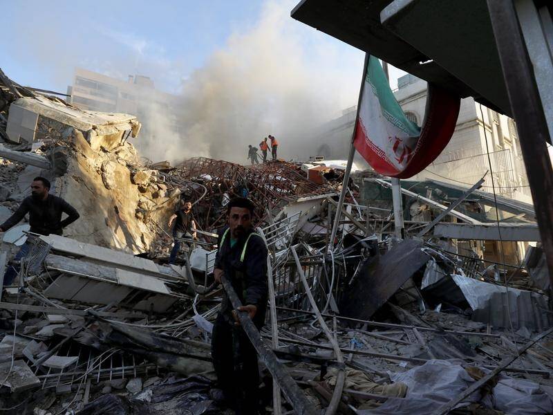 An Iranian consulate building in Damascus has been levelled in a suspected Israeli air strike. (AP PHOTO)