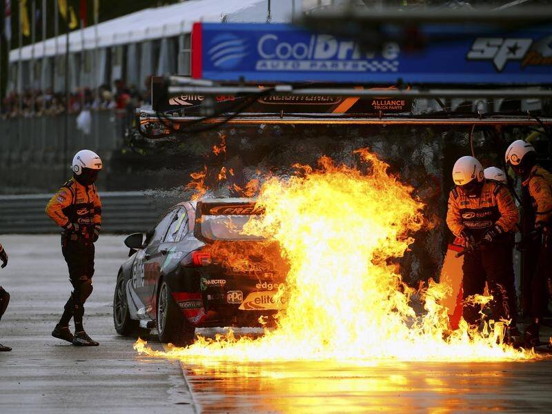 Nick Percat's car has caught fire in a dramatic Supercars pit stop in Townsville.