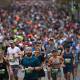 About 60,000 people took part in the 50th edition of Sydney's City2Surf fun run on Sunday. (Steven Saphore/AAP PHOTOS)