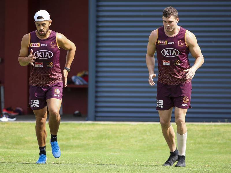 Broncos winger Corey Oates (R) is training strongly after being hospitalised with a leg infection.
