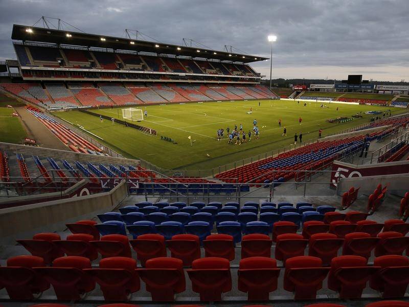 An unnamed Newcastle Jets player has tested positive to coronavirus after the A-League was shutdown.