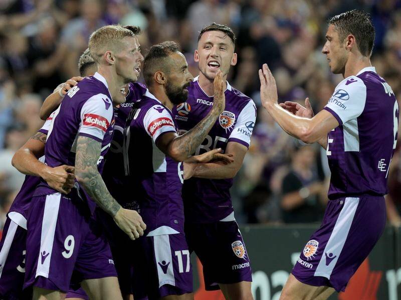 Perth Glory have moved nine points clear atop the A-League after a thumping win over Brisbane.