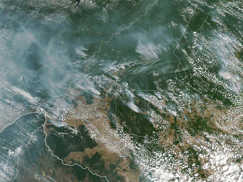 A NASA satellite image of fires burning in the Amazon rainforest.
