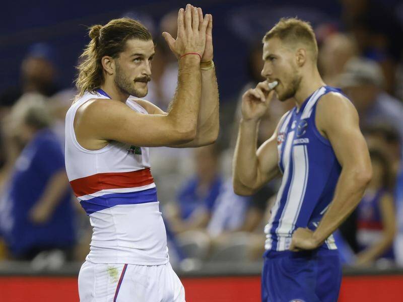 Luke Beveridge says it would be outrageous for Josh Bruce (l) to kick 10 goals against Brisbane.