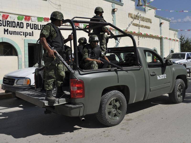 Federal authorities sent 600 special forces troops to Sinaloa to search for the missing people. . (AP PHOTO)