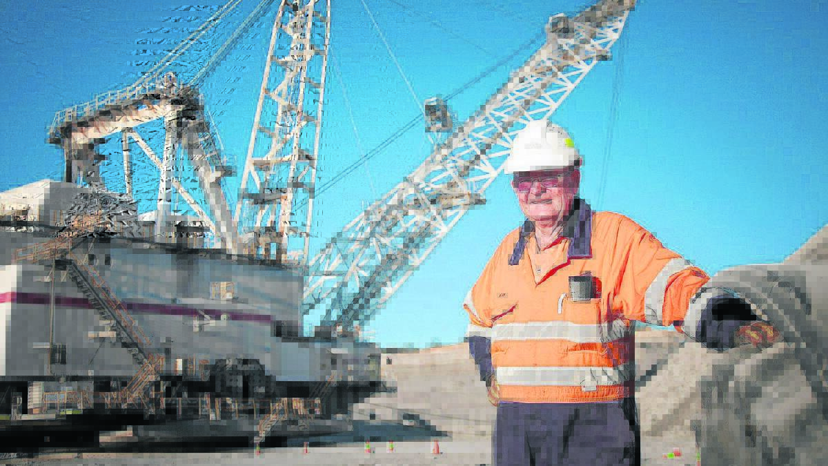 NEVER SICK:  Peter Constable pictured at this place of work Coal & Allied’s Hunter Valley Operations. He has worked at the mine for 45 years and never taken one sick day.