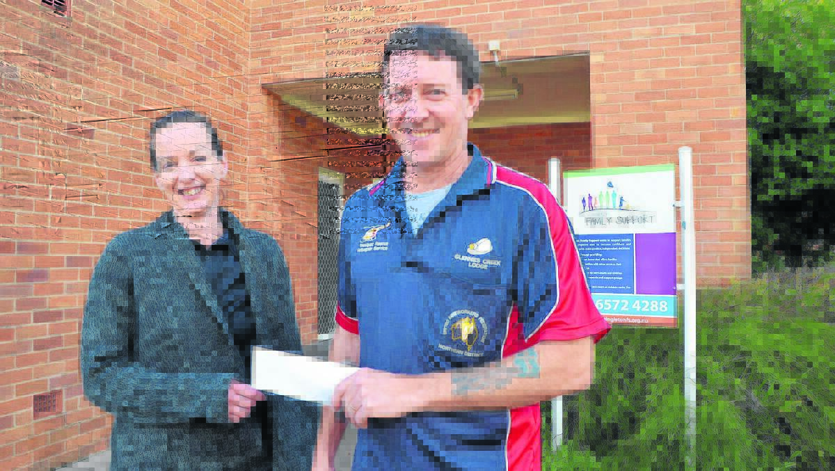 GREAT HELP: Singleton Family Support, manager Natalie Sowper and Glennies Creek Lodge, secretary Todd Hardy. The Lodge  donated $17,500 to Family Support.